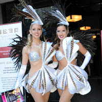Showgirls Beautiful showgirls will welcome guests, pose for photos and mingle! Showgirls available for live dance performances and freeze pose modelling! Many colours and styles to choose from