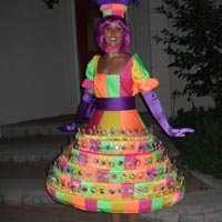 Lollipop Dress This colourful custom creation holds 275 lollipops or wrapped cake pops! Its bright and colourful! Always a hit and an excellent photo op!